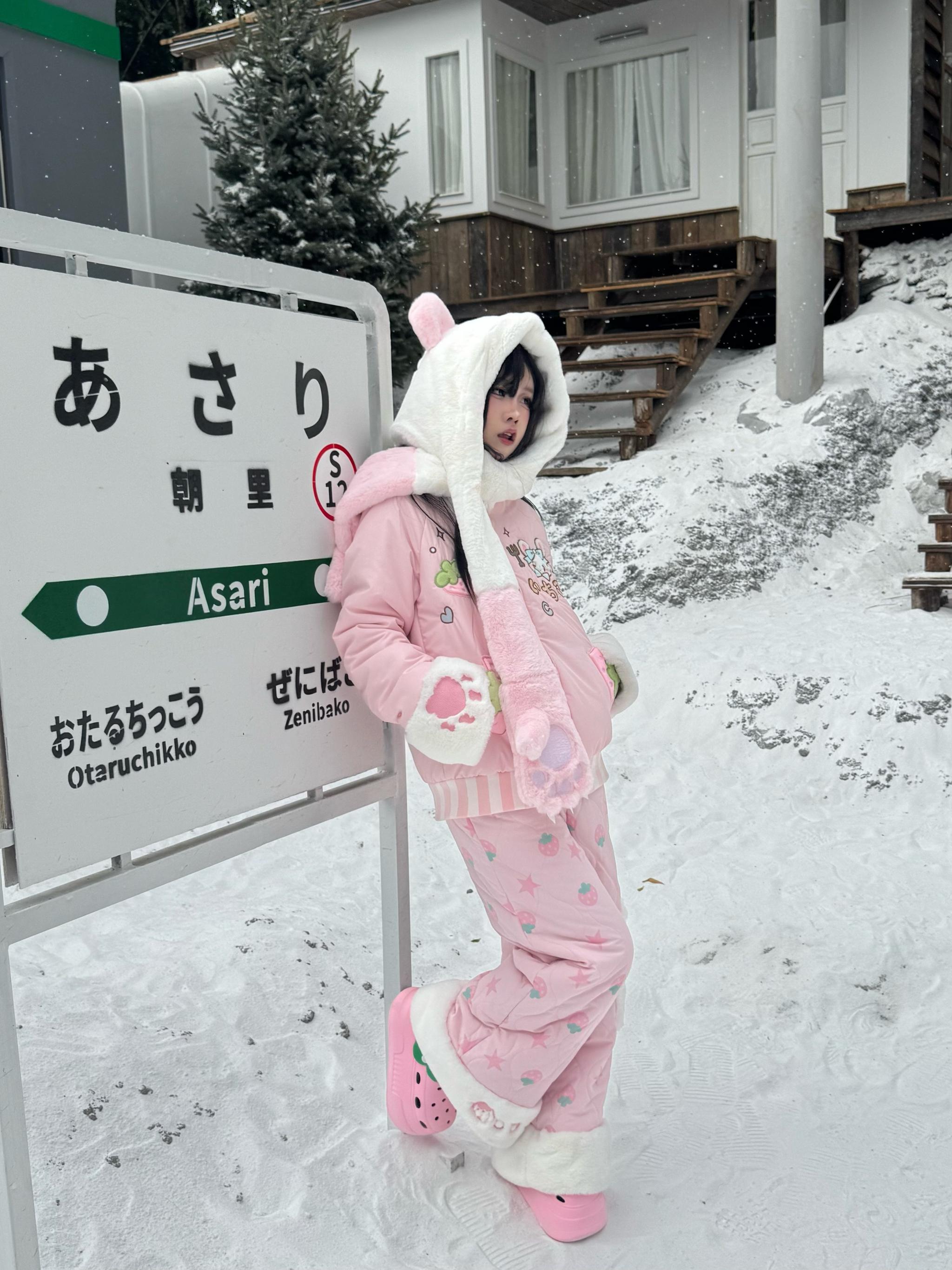 Pink Jirai Kei strawberry padded winter coat flat lay showing full coat silhouette, fuzzy trim details, zipper closure, and overall design aesthetic