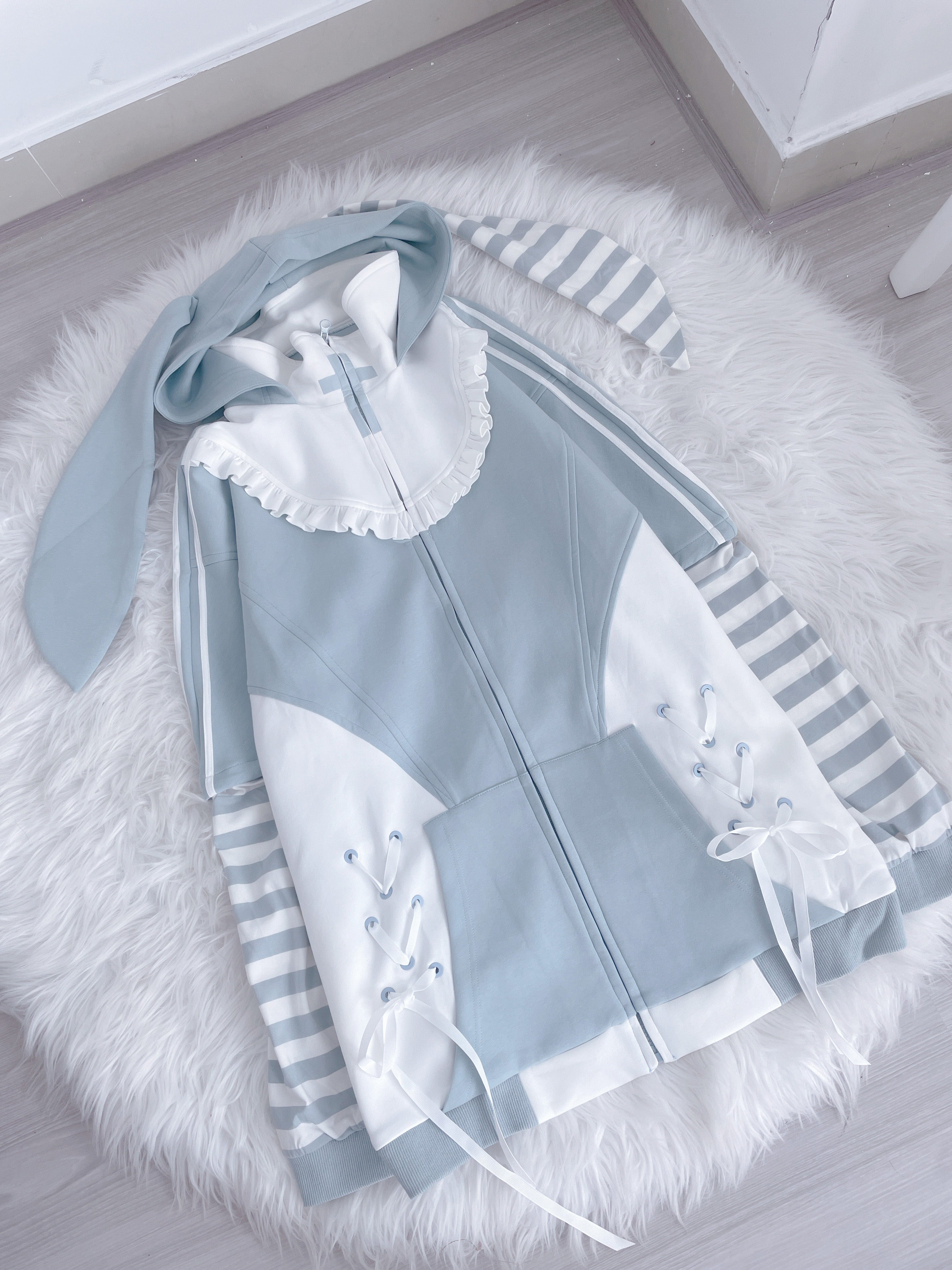 Blue Tenshi Kaiwai hoodie styling guide showing multiple wear options and outfit coordination suggestions