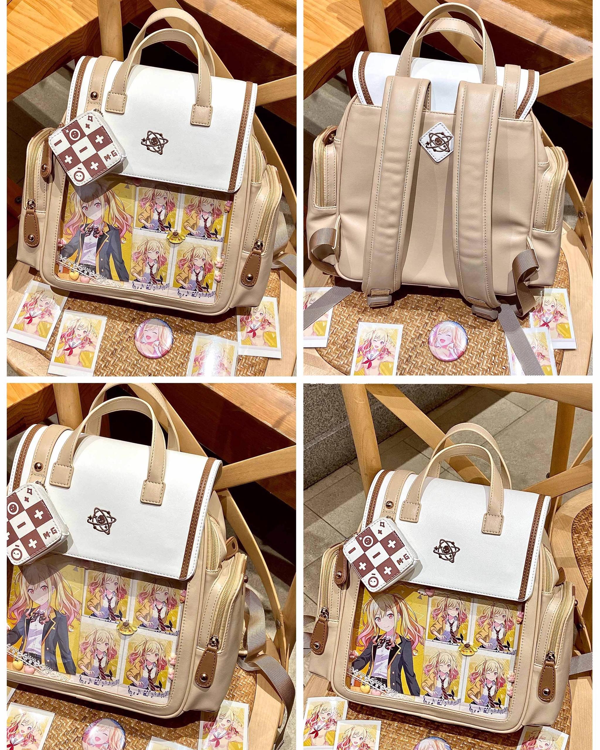 Multi-angle itabag school backpack display set showing four different views front back side angles with anime merchandise on table