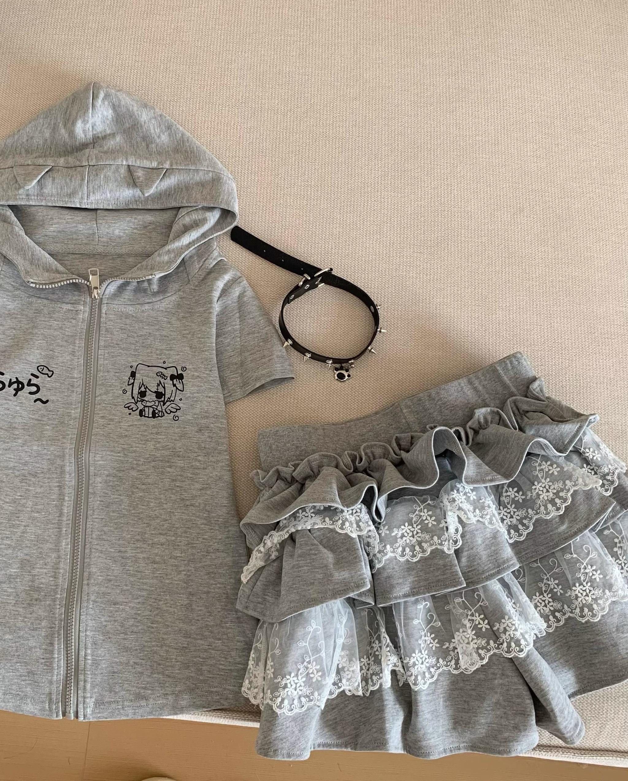 Jirai Kei lace tiered cake skirt and bunny zip-up hoodie set detail shot highlighting lace ruffle construction and fabric texture close-up
