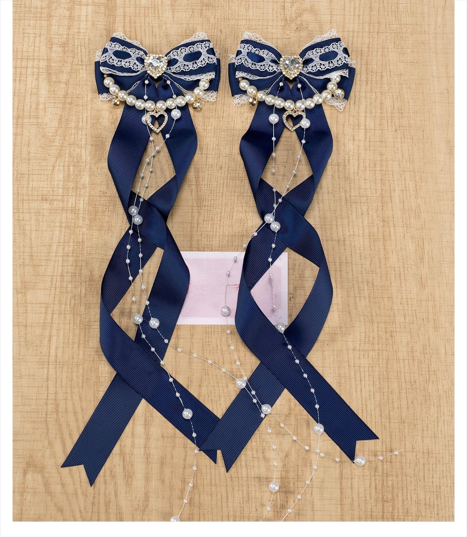 Jirai Kei navy blue ribbon bow hair clips with pearl chain and heart rhinestone accent detailed product view