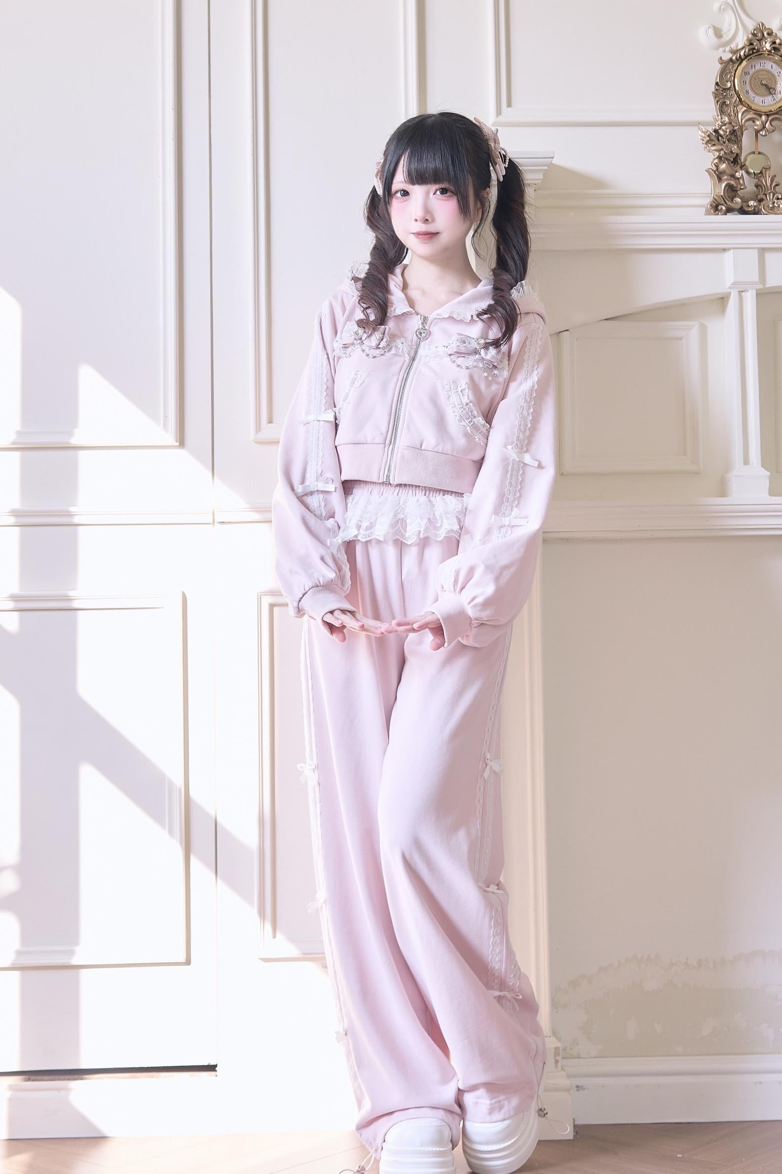Pink Jirai Kei wide-leg sport pants individual piece showing lace side stripe detail and athletic silhouette