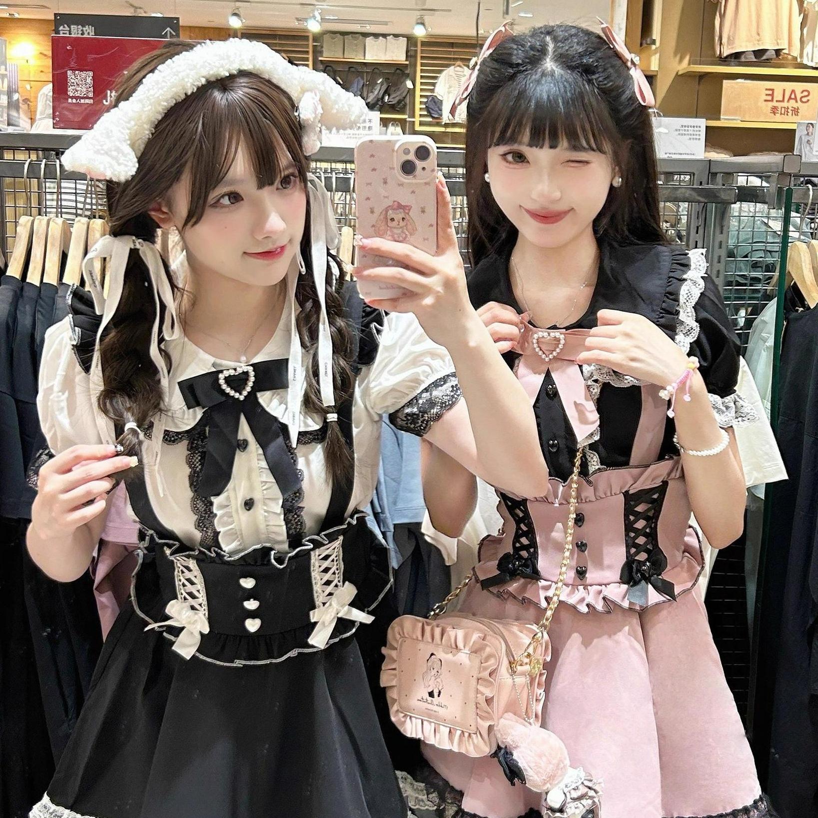 Peter pan collar blouse black lace trim detail close-up ruffled cuff elastic waist hem