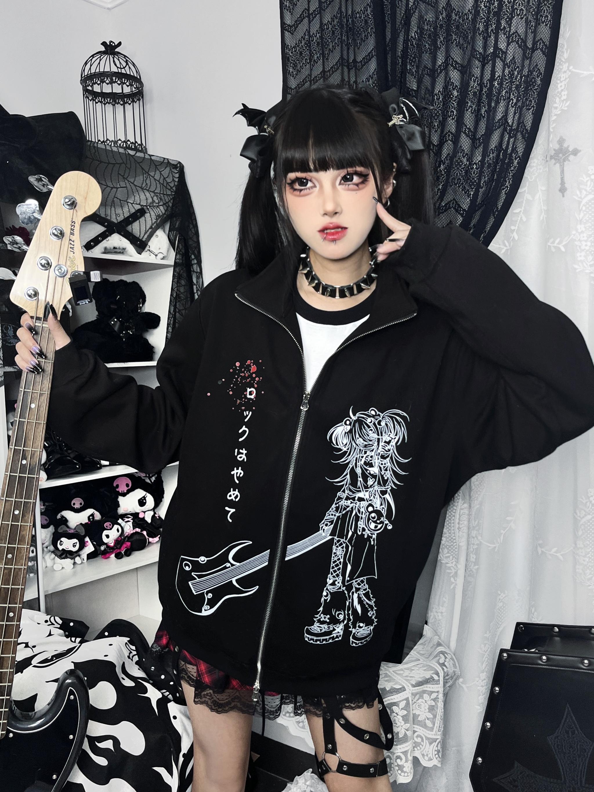 Close-up front view of Jirai Kei hoodie showing detailed white graphic print and polka dot collar on goth model
