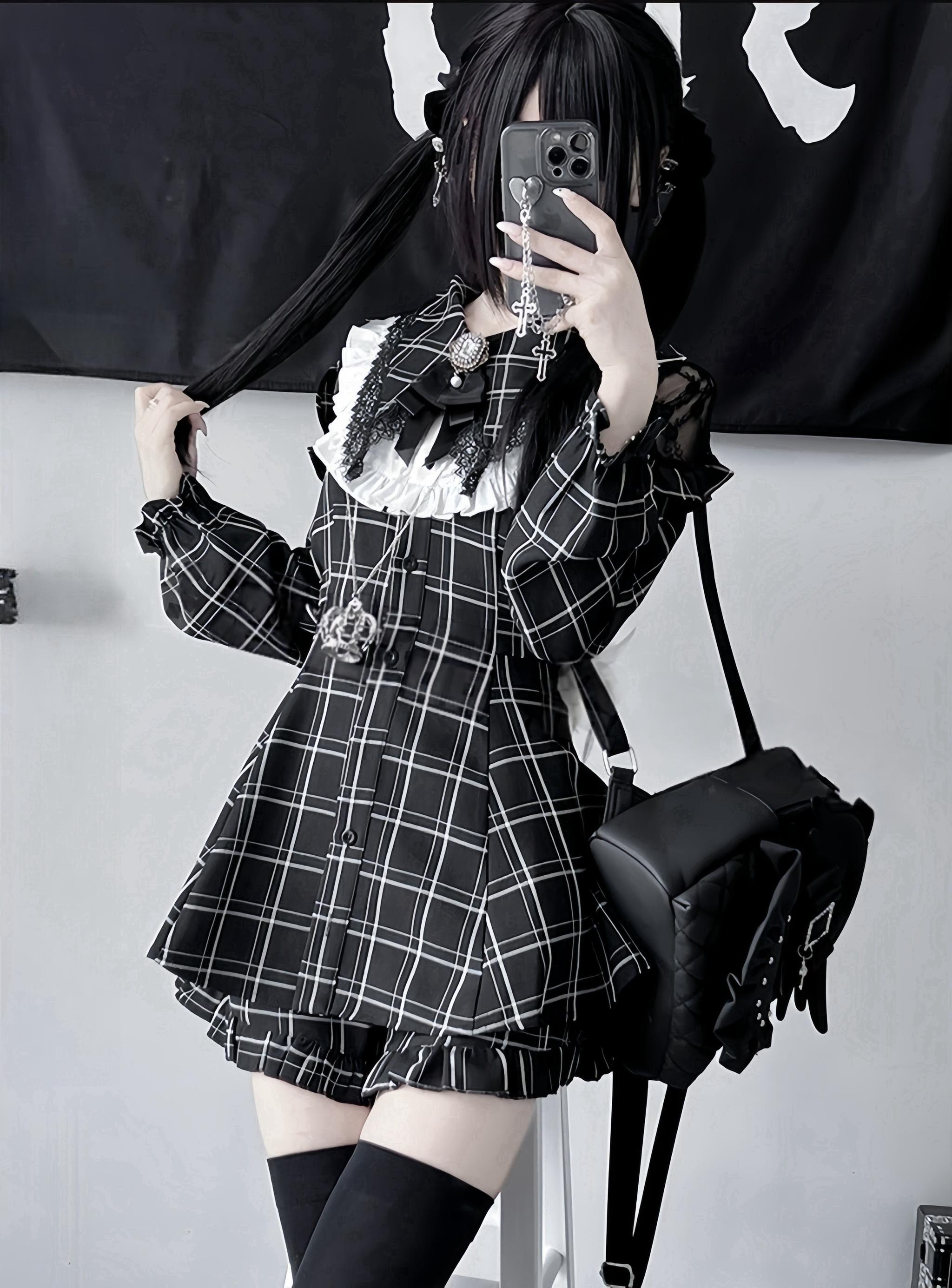 Plaid Jirai Kei dress set mirror selfie view showing lace collar, cross pendant accessory and shoulder bag in dark themed room
