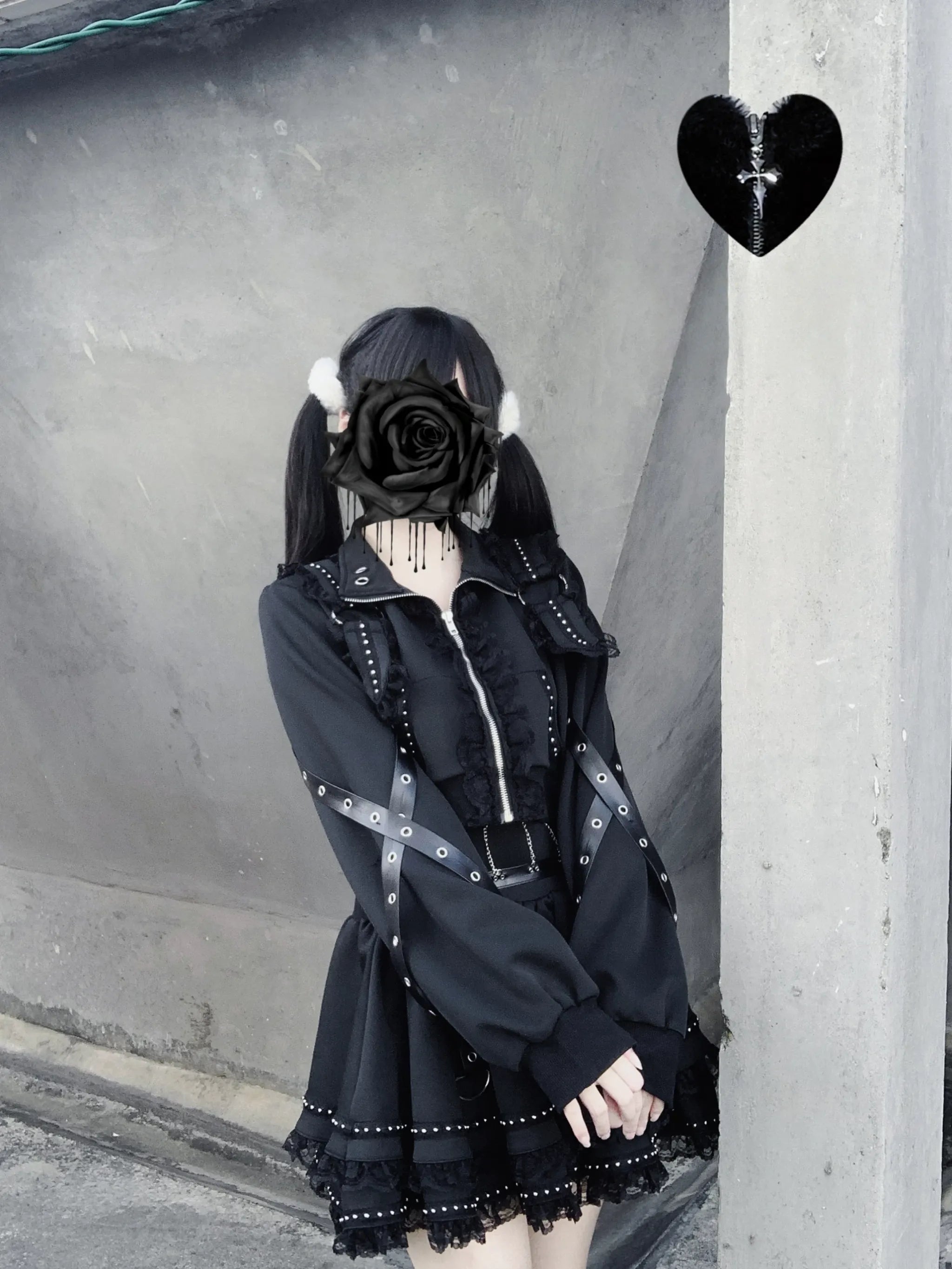 Side profile Jirai Kei punk two-piece suit cross shoulder straps rivet trims lace hem skirt all black tone concrete pillar background
