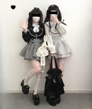 Jirai Kei long sleeve blouse ruffled collar three quarter front view with bunny plush accessories