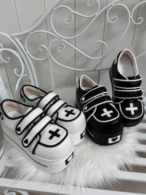 Tenshi angel heart platform shoes two colorway variants displayed on white furry bed hook and loop straps rounded sole detail