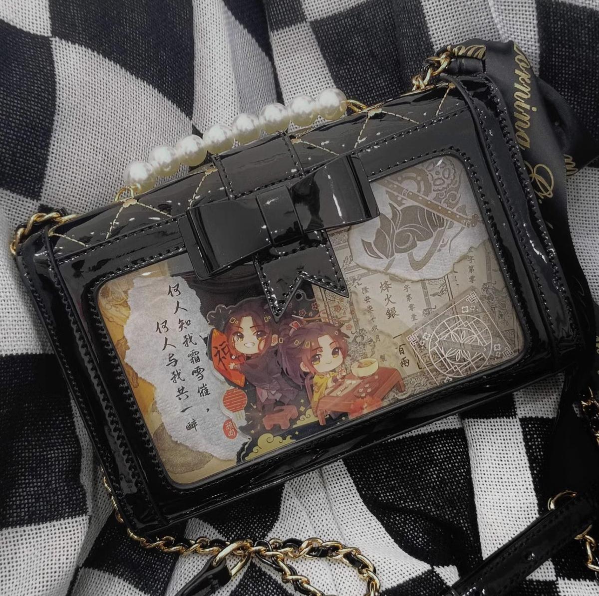 Green colored jirai kei ita bag with rhombus quilted pattern and removable bow on display