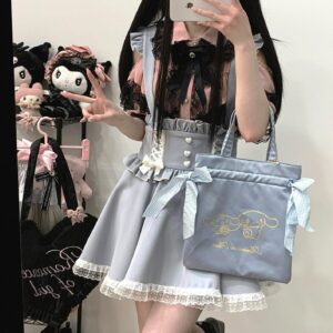 Light blue Jirai Kei suspender skirt back mirror selfie with pearl buttons gingham ribbon bow and embroidered tote bag details