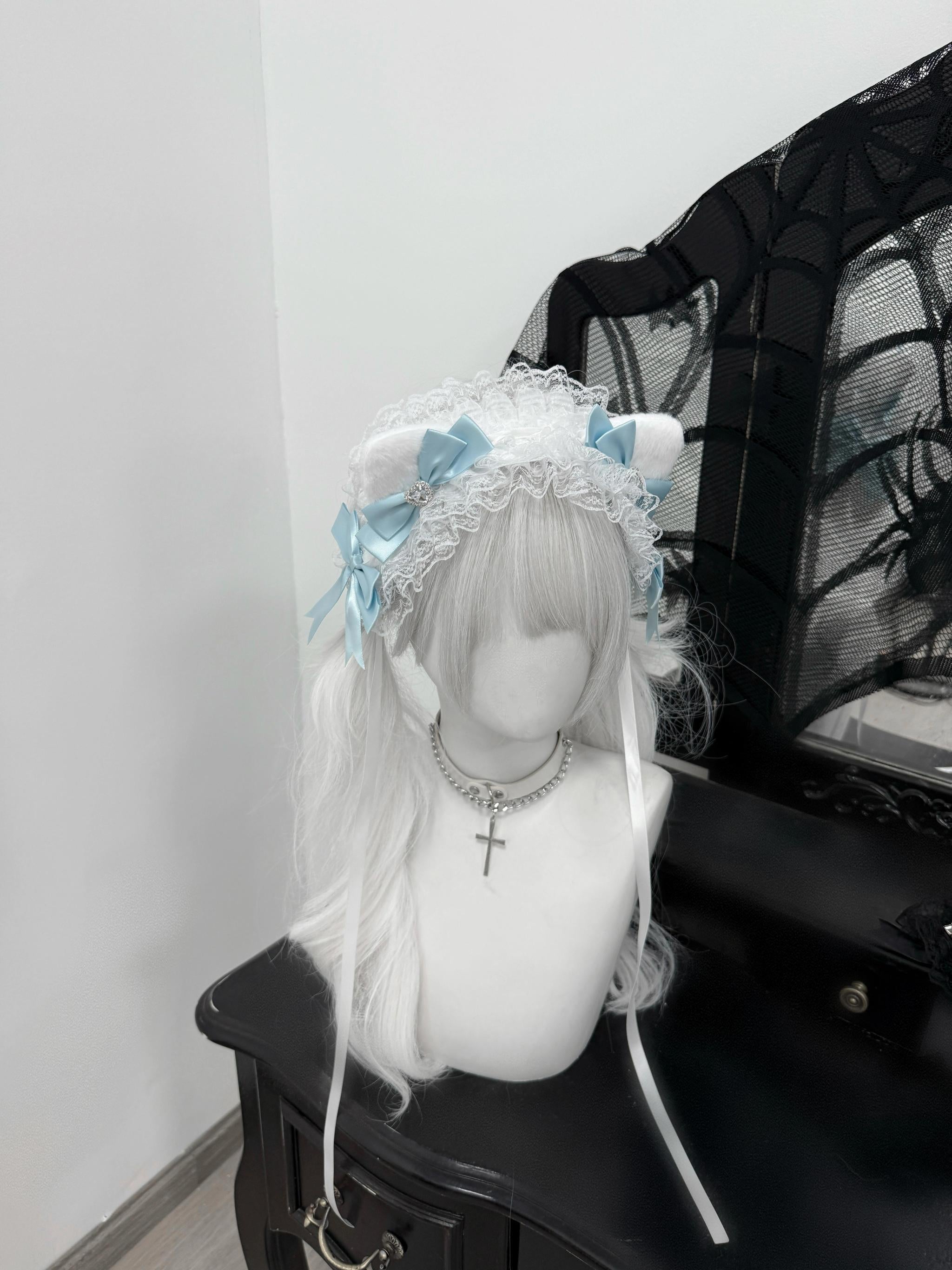 Sky blue cat ear headband jirai kei style with satin bows and long ribbons right side angle view