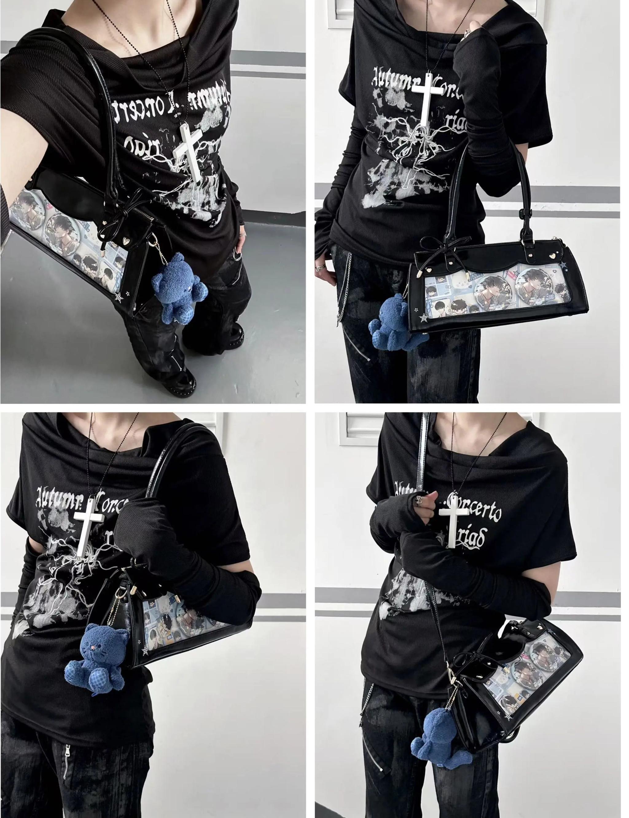 Vintage baguette itabag with bow detail and anime pin badges in sophisticated display setting
