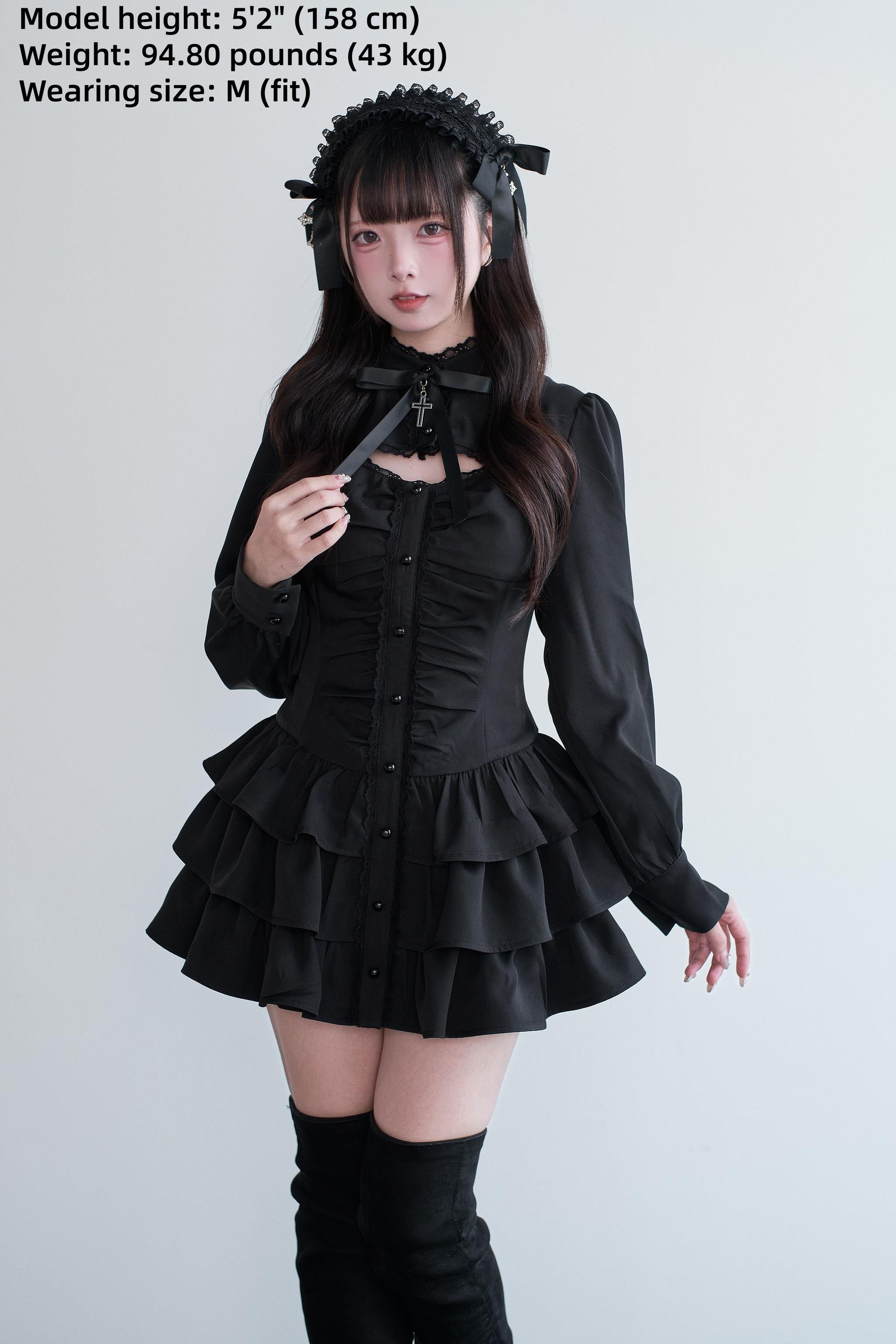 Front detail of black Jirai Kei gothic dress with bow neck decoration and ruched front bodice