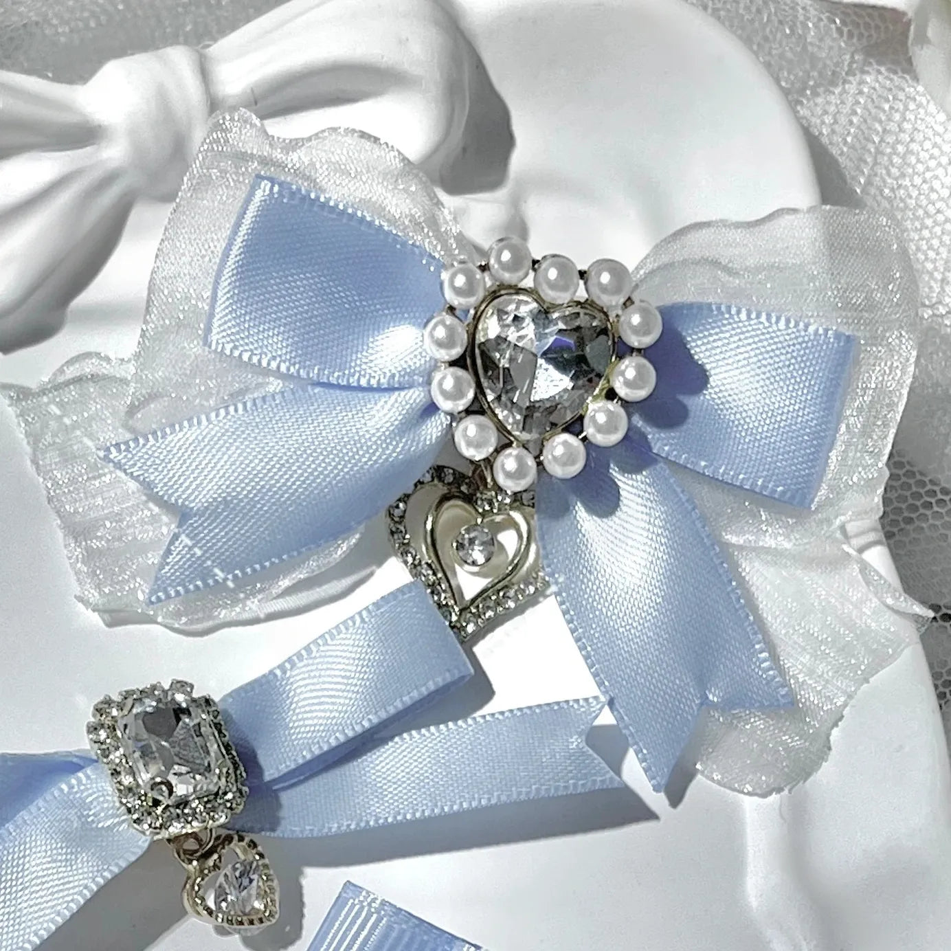 Water blue double-layer bow hair clips Jirai Kei aesthetic with intricate layered construction and decorative embellishments