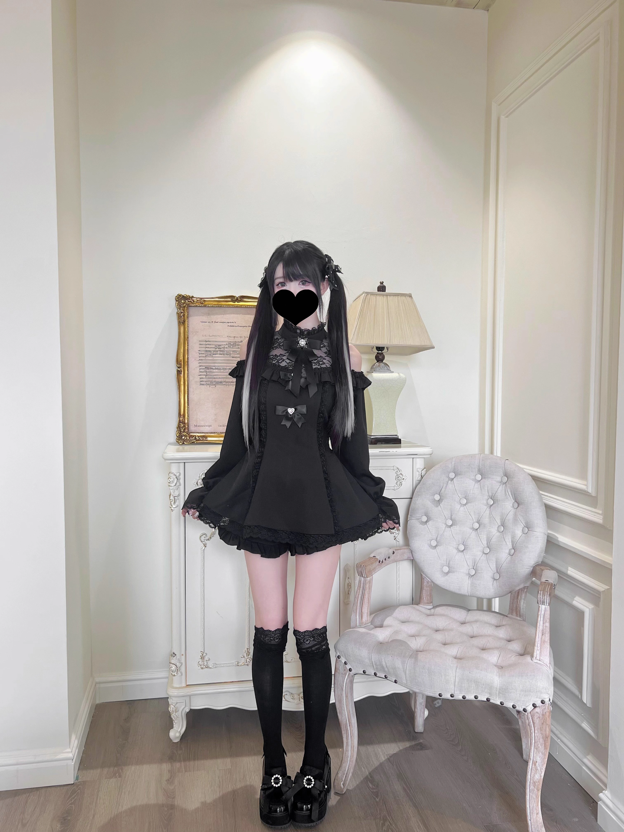 Off-shoulder Jirai Kei dress shorts set styling with accessories and vintage indoor scene