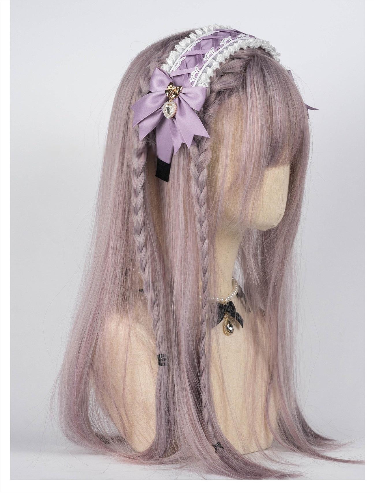 Light purple lavender Jirai Kei lace headband featuring two-tone ruffled lace, satin bow with heart rhinestone pendant, modeled on mannequin with lilac braided wig, right side angle