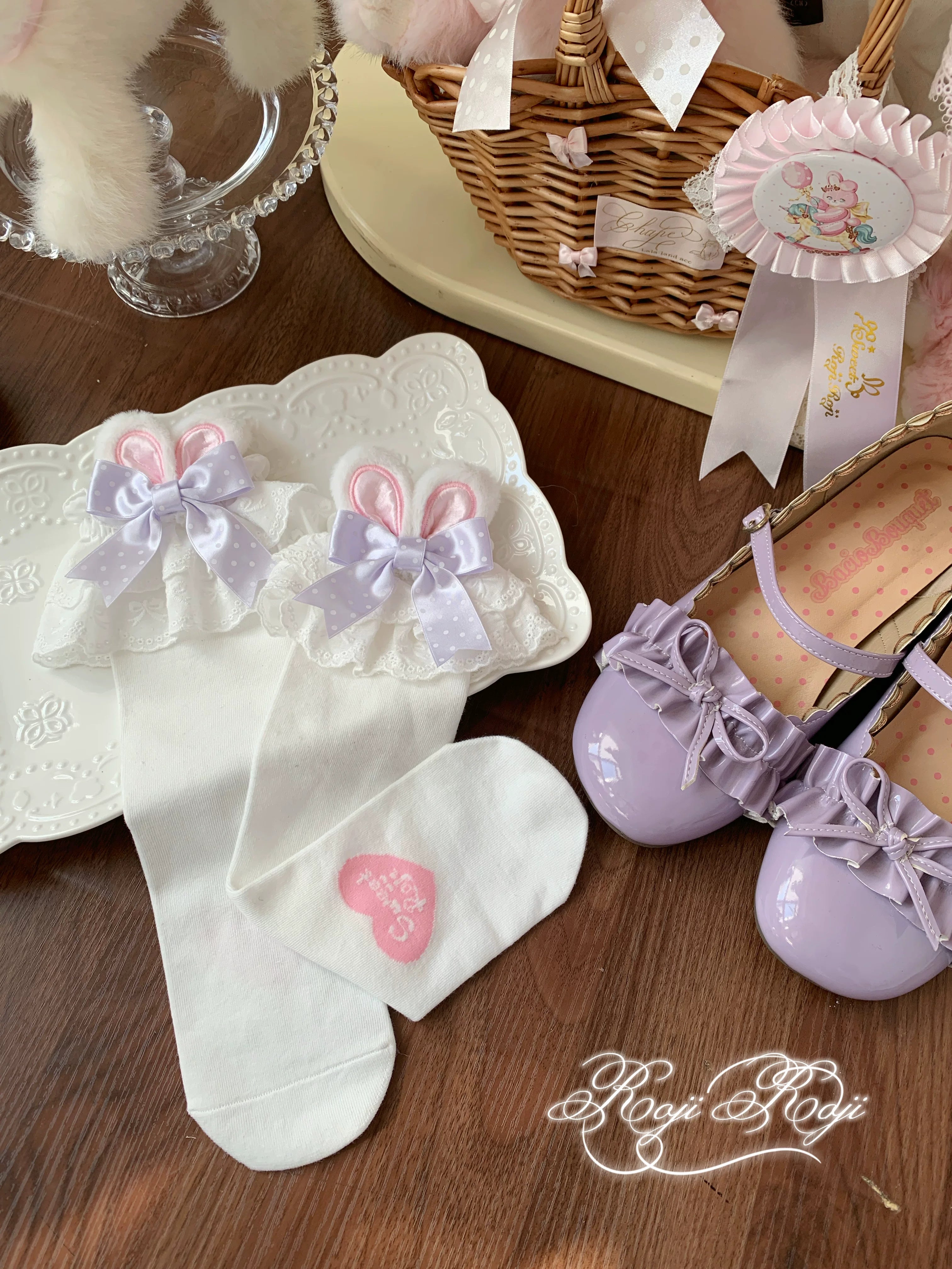 Jirai Kei light pink polka dot bunny ear socks with white base and lace trim detail for sweet Lolita fashion coordinates