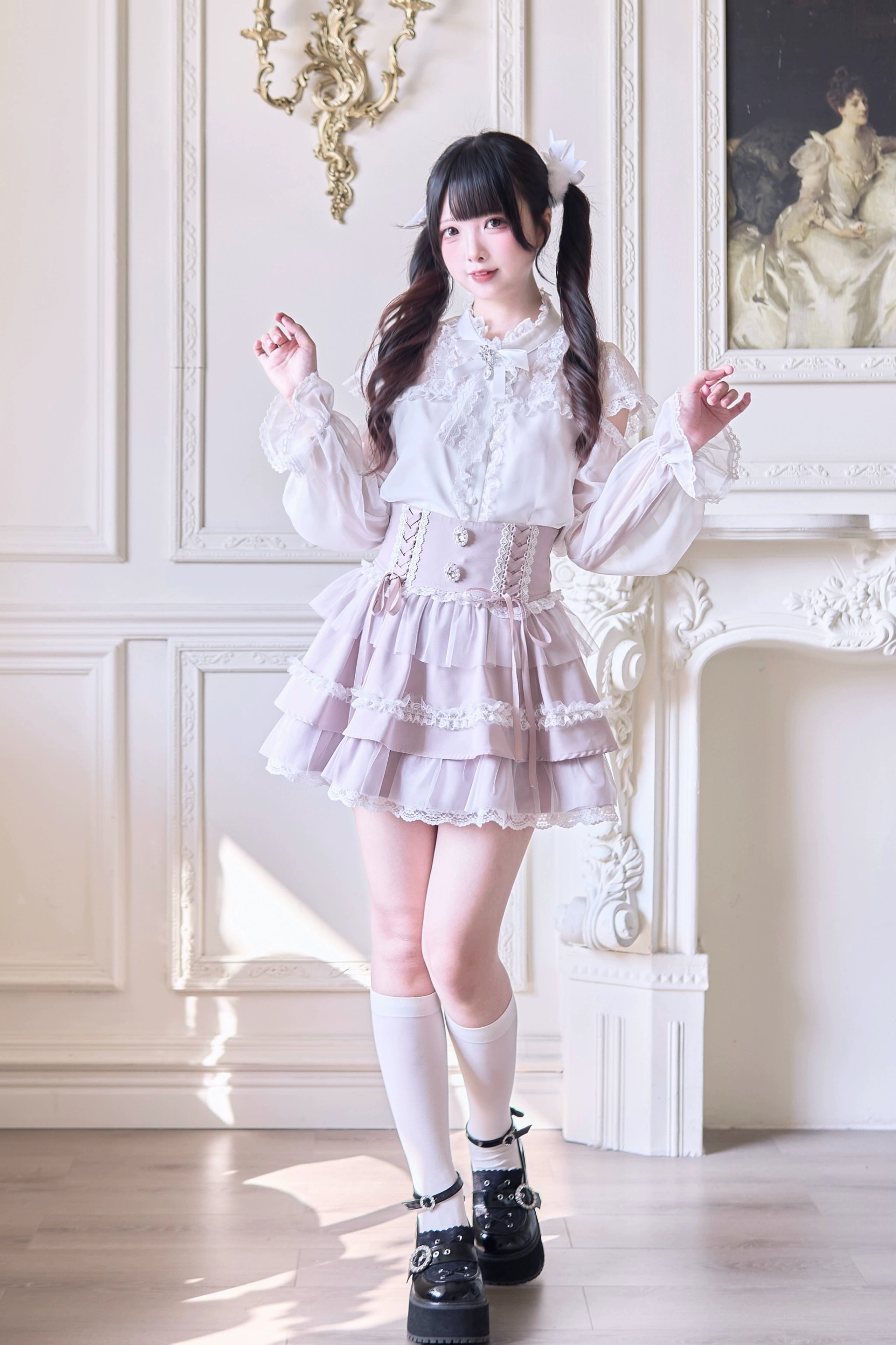 Ethereal tiered ruffle Jirai Kei skirt with pearl rhinestones and mesh hem in soft pink, full-body front view showcasing romantic aesthetic