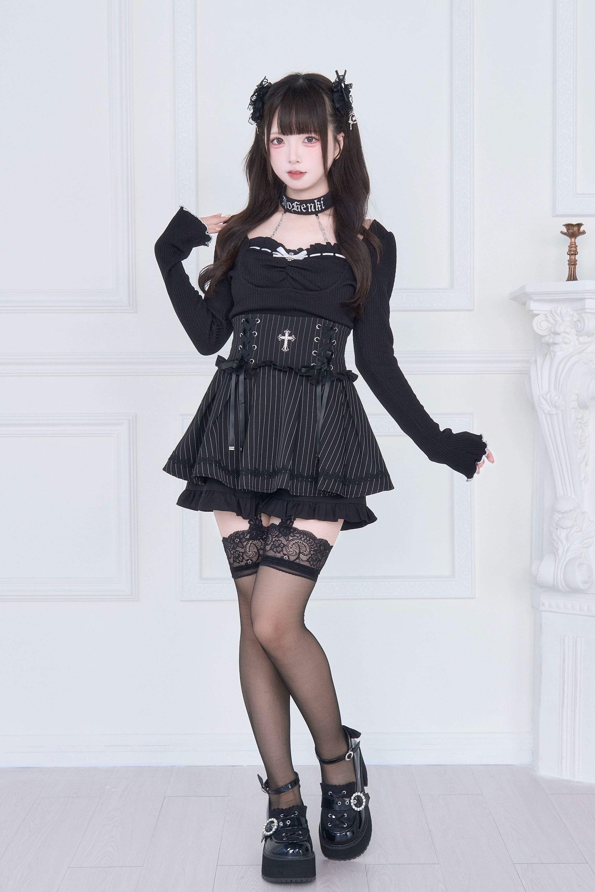 Long sleeve black square neck Jirai Kei top pinstripe corset ruffled skirt full body three-quarter view