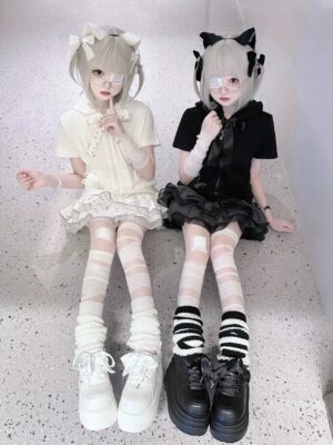 Jirai Kei platform sneakers round-toe overhead view twin models white black frilly skirts thick platform soles