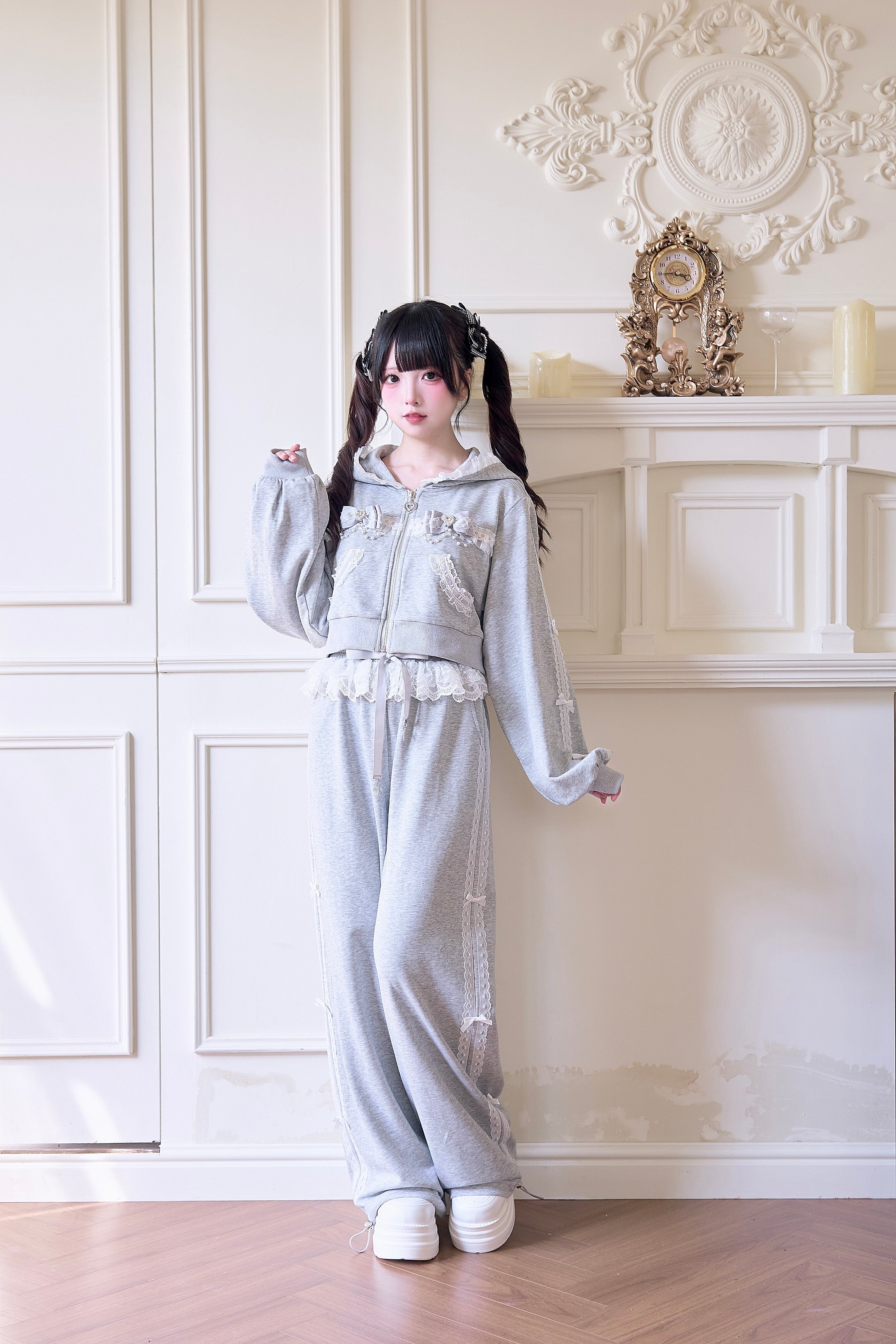 Gray Jirai Kei sport pants close-up detail view showing lace side stripes and wide-leg athletic silhouette