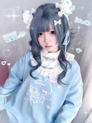 Light blue Jirai Kei cat print sweatshirt with white ruffled collar detail and cartoon cat chest design, front close-up view showcasing adorable kawaii aesthetic