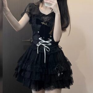Black Jirai Kei lace blouse with white corset lacing and tiered ruffle skirt mirror selfie - front view showing doll collar and puffed sleeves