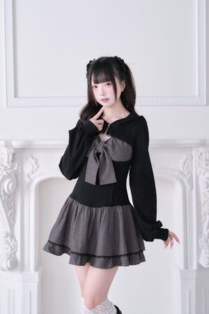 Gray striped Jirai Kei hoodie one-piece dress with grey bow and ruffled hem, front pose on model with twin-tail hairstyle
