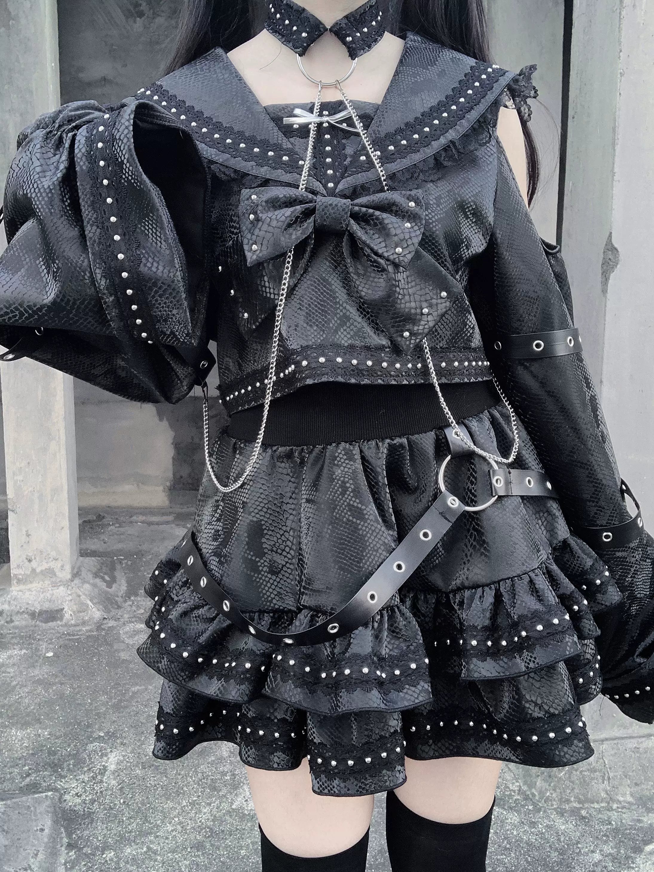 Detachable choker and chest bow components from gothic sailor two-piece set showing hardware quality and styling versatility options