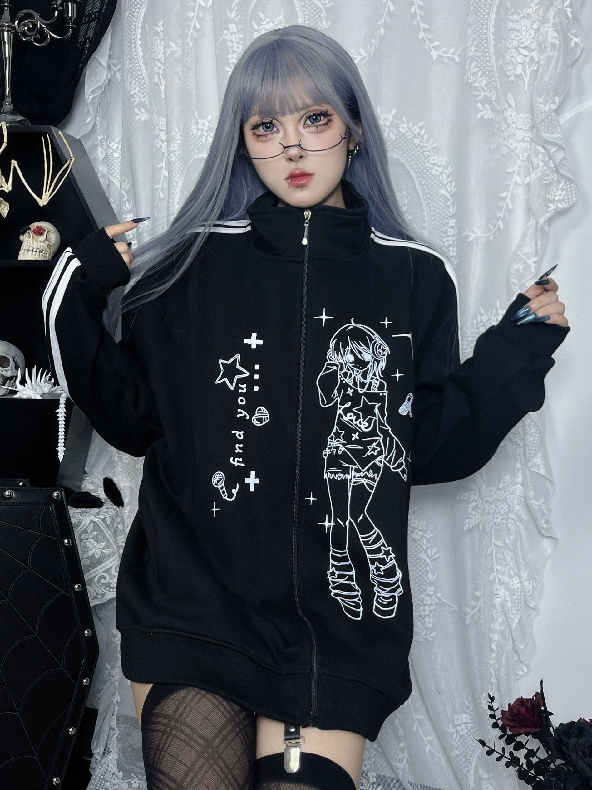 side-front full body view of black stand collar zip jacket with white sleeve stripes and detailed anime character print design