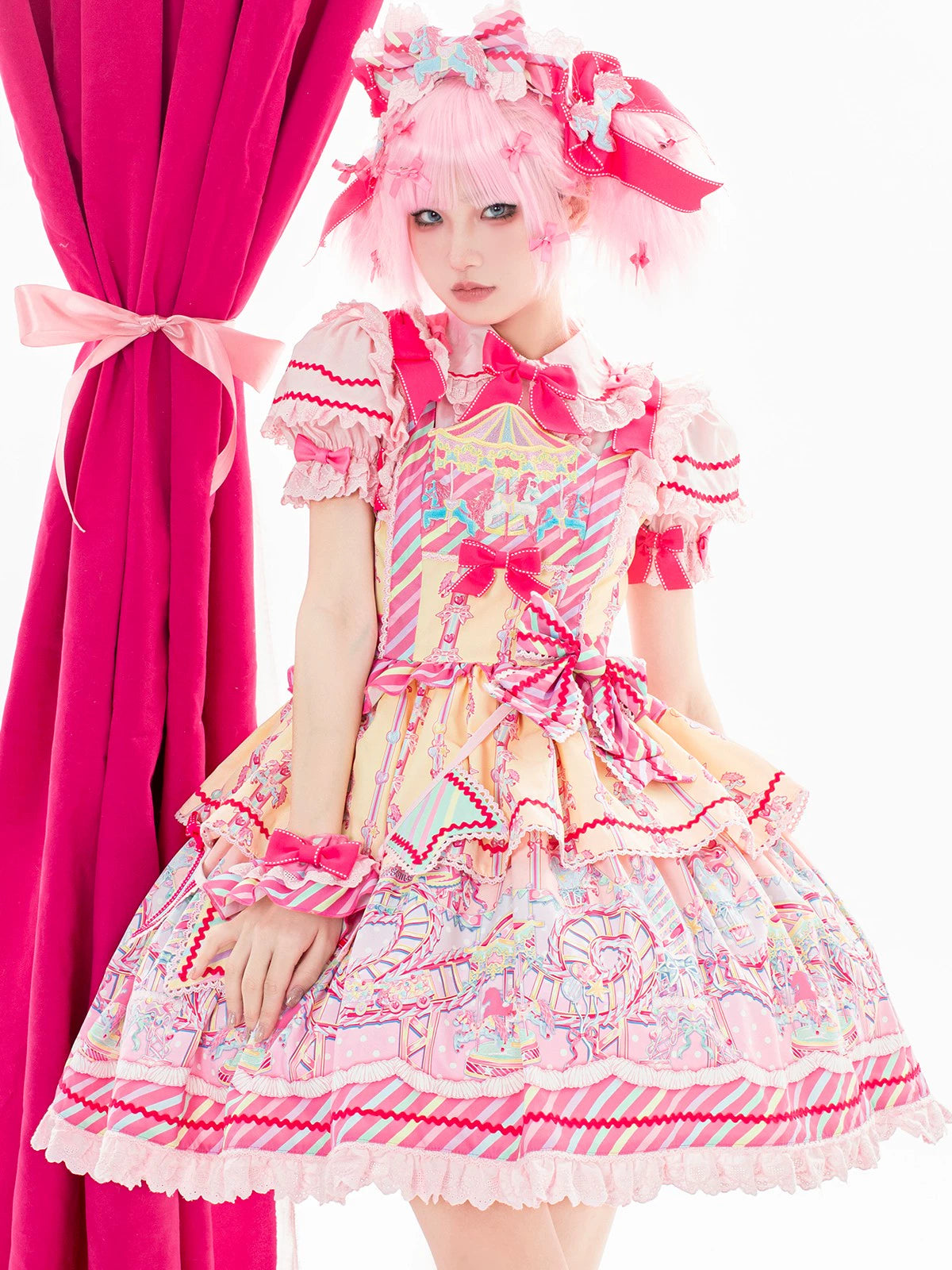 Full body front shot of Jirai Kei sweet Lolita JSK with colorful amusement park prints puff sleeves and striped trim hem