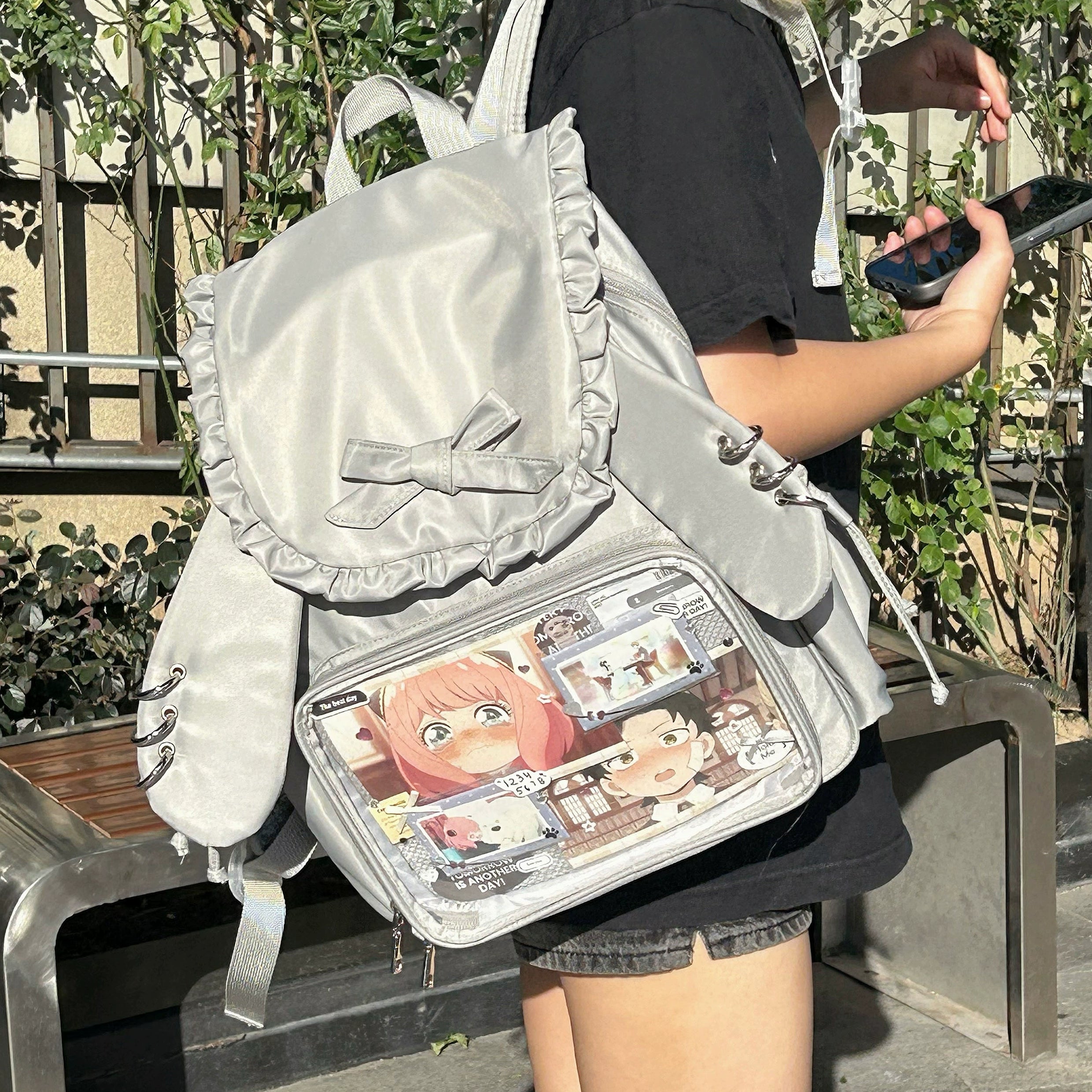 Jirai Kei kawaii itabag backpack interior pocket organization showing separate badge and trinket compartments