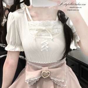 White Ryousangata puff sleeve slim-fit lace blouse with square neckline and crisscross lace-up front detail, worn by twin-tailed model showing close-up front view, Jirai Kei fashion style