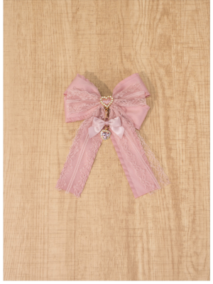 Compact pink satin lace bow brooch pendant detail view showcasing delicate lace texture and satin ribbon construction for Jirai Kei fashion