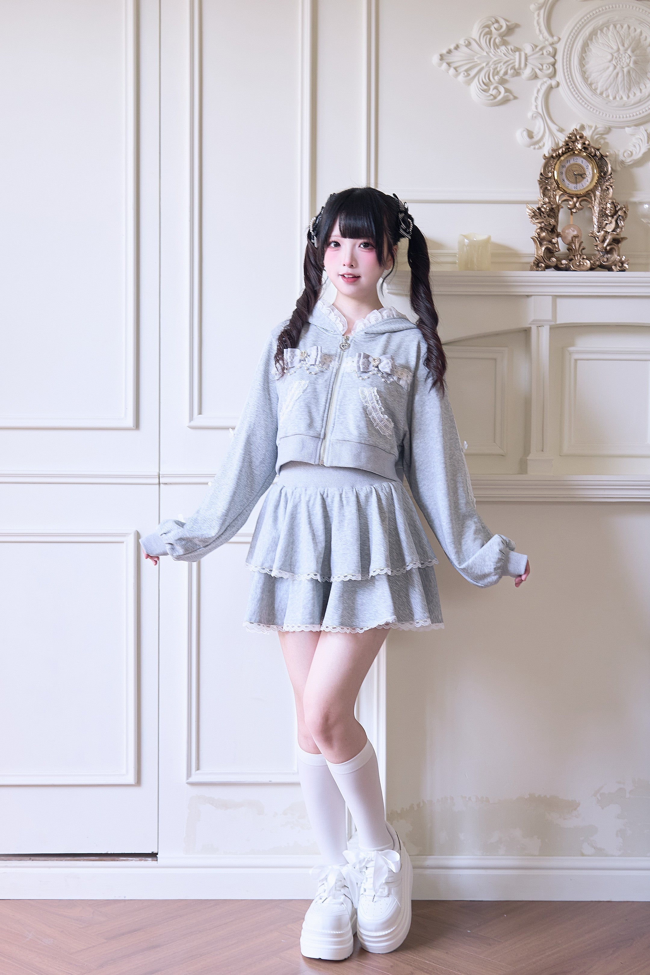 Jirai Kei lace sport hoodie coat detail shot showing detachable bow charms and lace chest trim embellishments