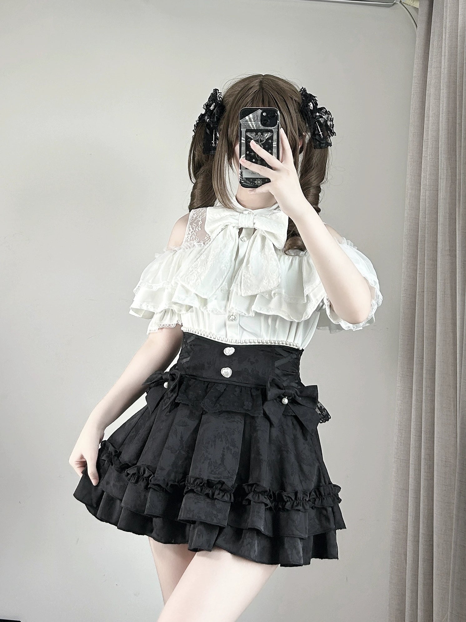 Black jirai kei ruffle skirt side zipper closure and back shirring detail, showing adaptive fit and construction craftsmanship