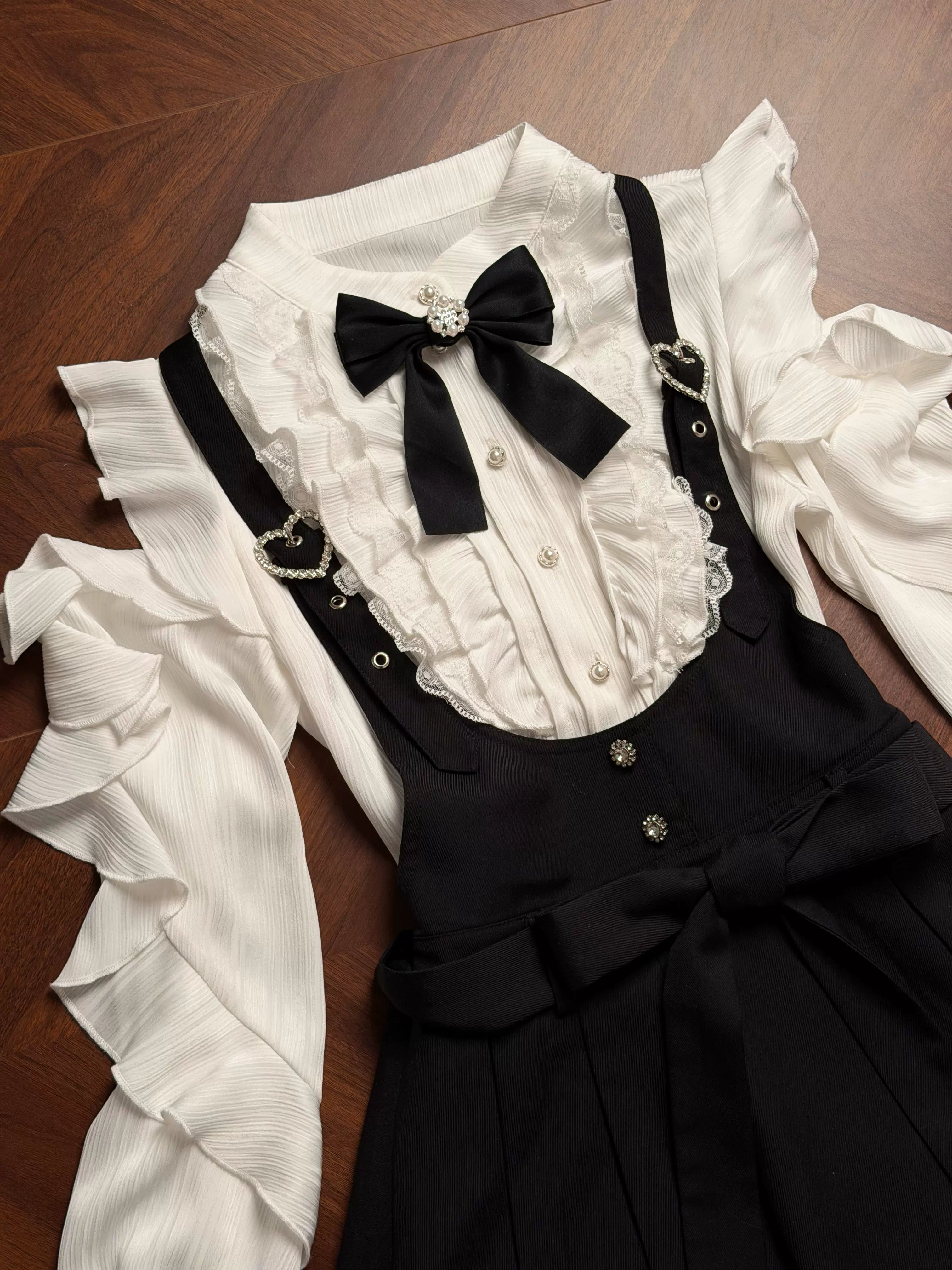 Jirai Kei white off-shoulder ruffled blouse sole item with decorative details faux pearl embellishments button closure