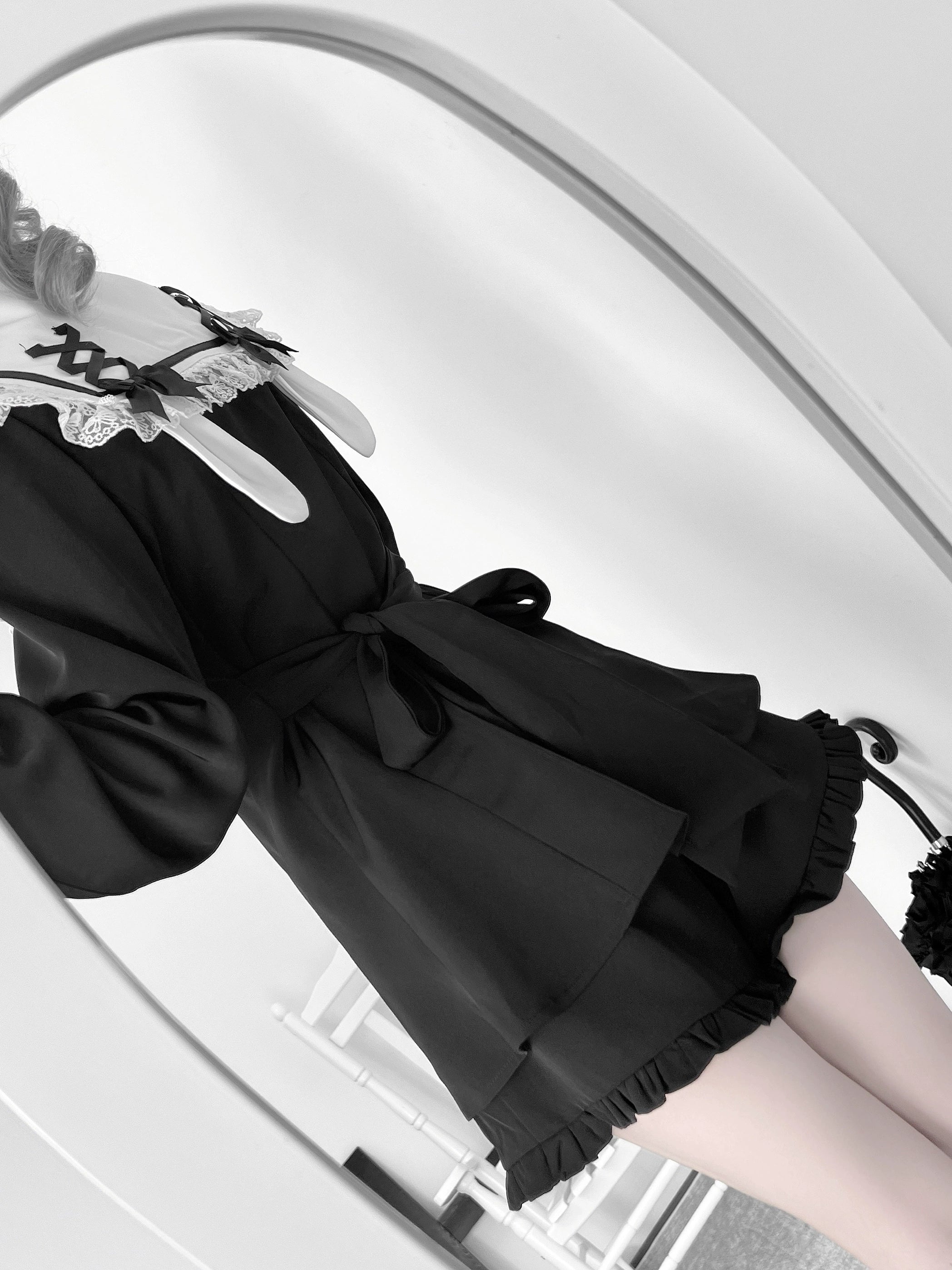 Jirai Kei black sailor collar bunny-ear detailed close-up, ruffled skirt hem waist tie design detail shot