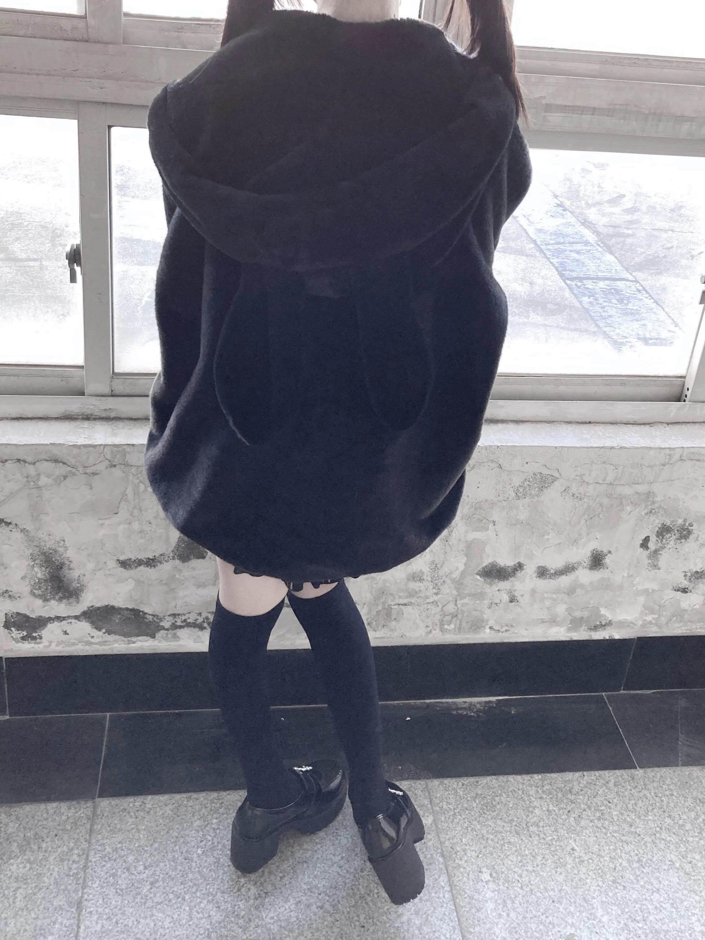Black plush hooded coat full styling view with bunny ears hood showing complete jirai kei aesthetic
