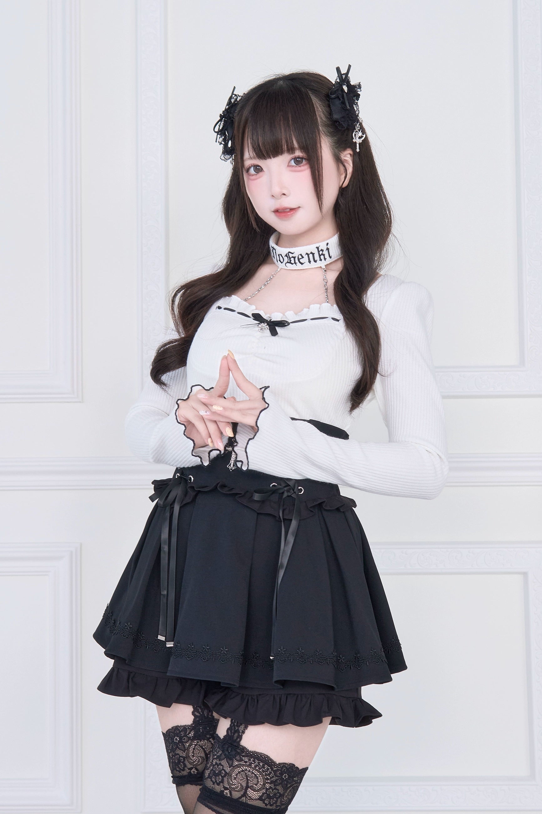 Off-shoulder white Jirai Kei top cross corset belt ruffled mini skirt two-tone outfit front medium shot