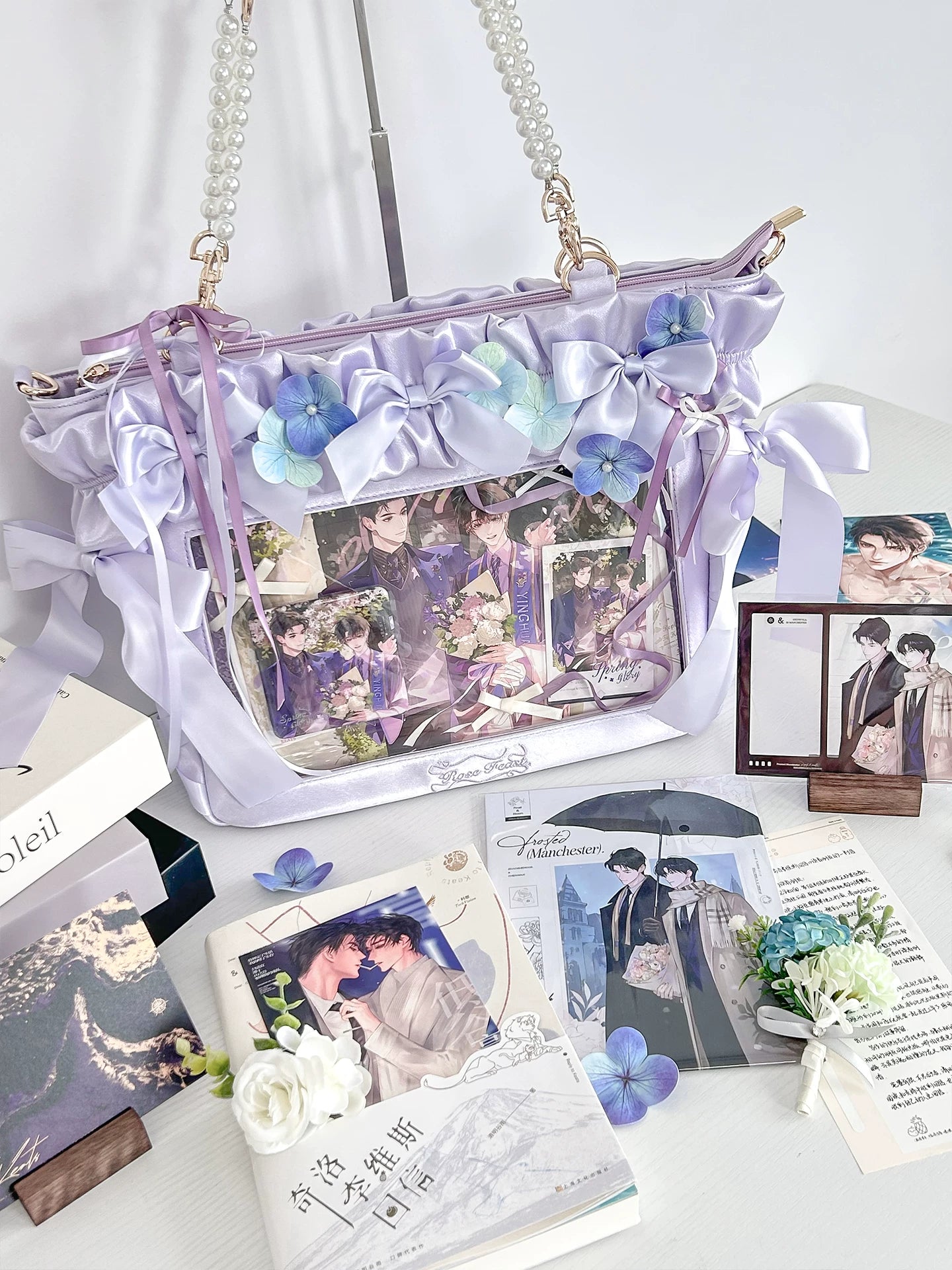 Jirai Kei itabag purple color variant showing lavender tone with ruffled details pearl handles and character badge window