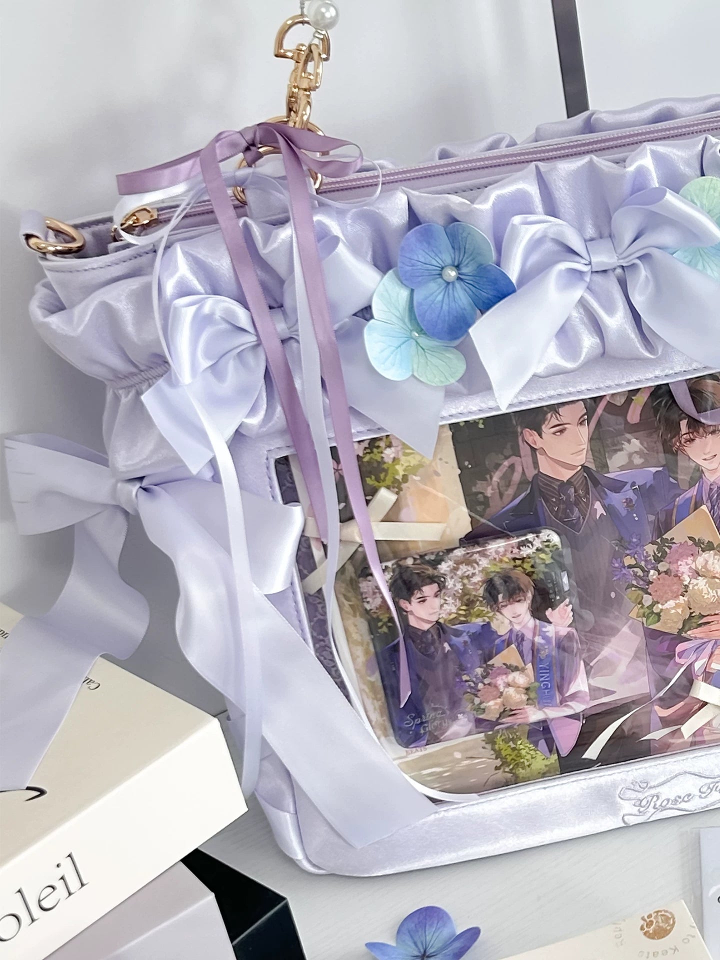Jirai Kei itabag sakura pink variant showing romantic rose shade with delicate bow accents clear collectible display window