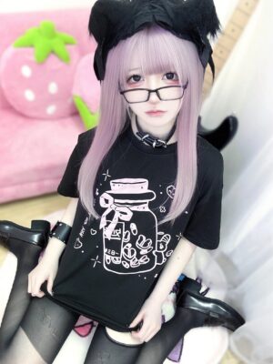 Black Jirai Kei drift bottle t-shirt with pink bow jar print full seated shot purple hair model strawberry sofa
