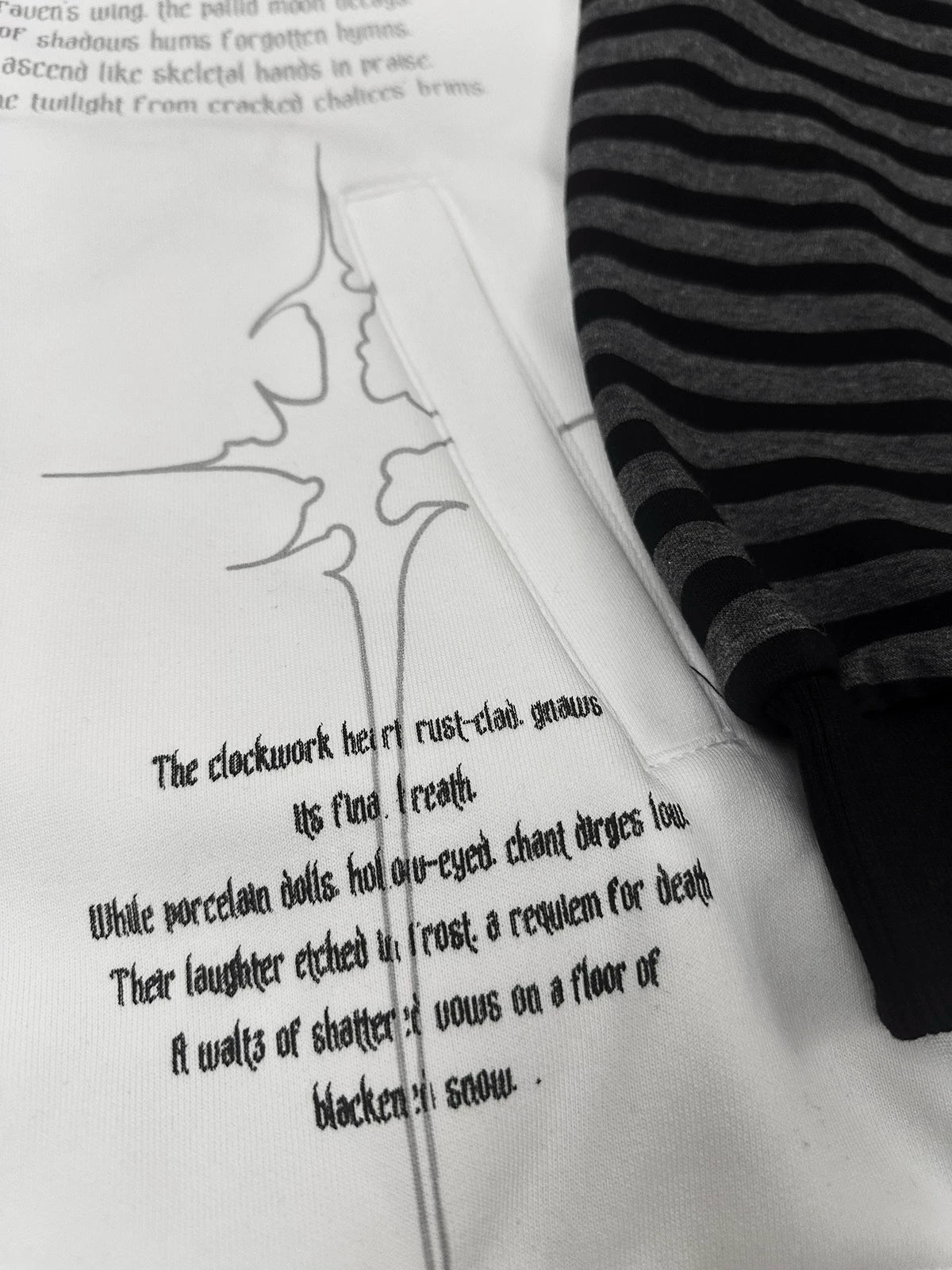 Hooded scythe print zip coat care instructions showing washing drying storage methods for print preservation and longevity