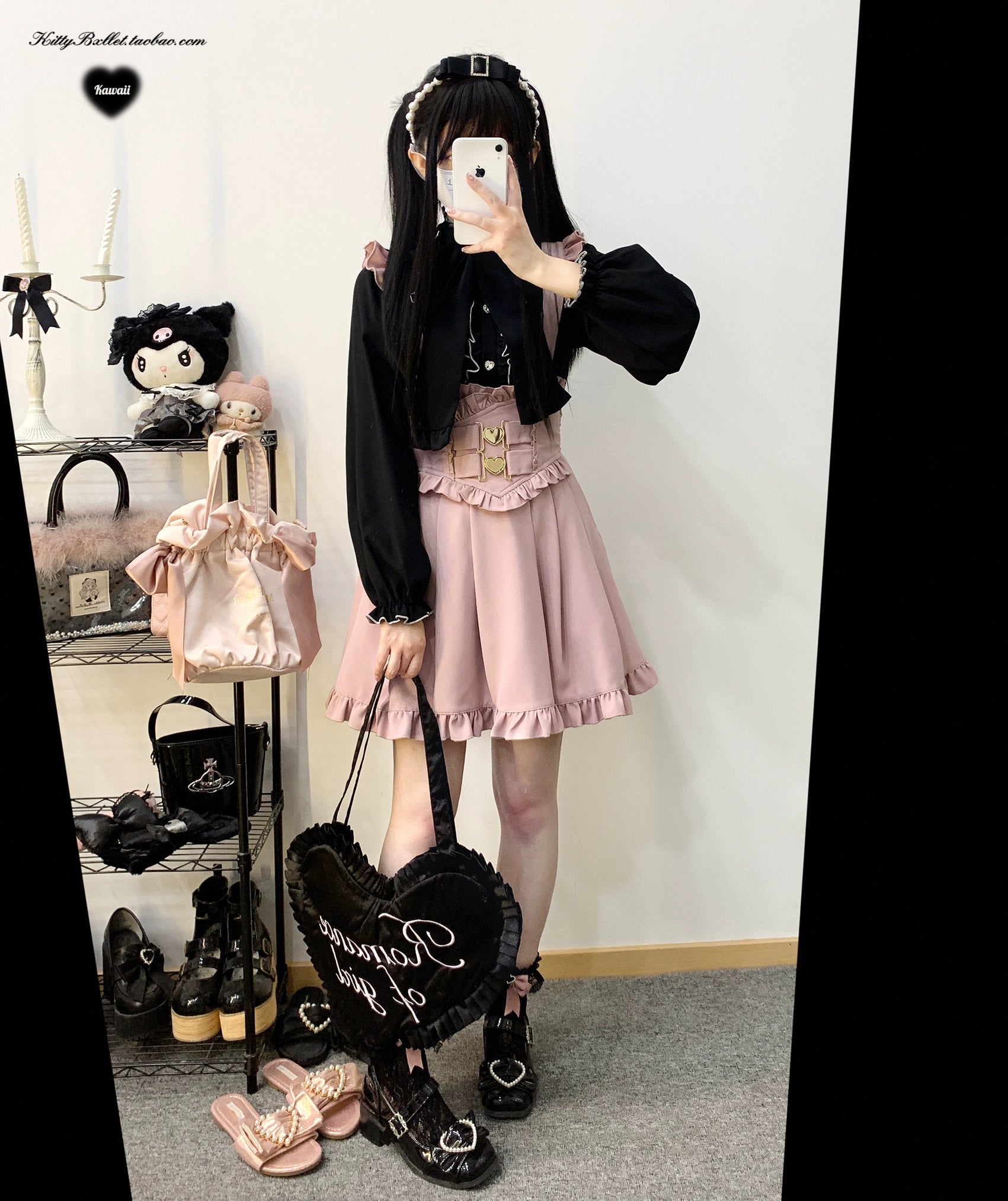 Complete Jirai Kei coordinate with pink ruffled suspender skirt black ruffled top black heart handbag and black platform flat sandals styling