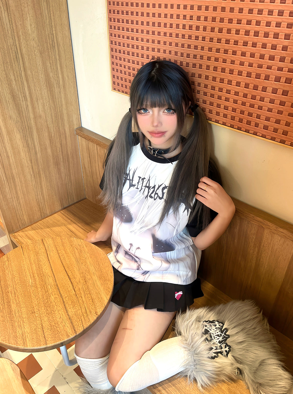 Jirai Kei raglan sleeve T-shirt detail shot showing anime graphic print quality and color contrast between white and black sleeves