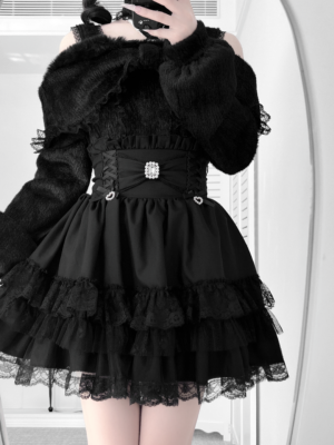 black tiered lace jirai kei mini skirt corset waist rhinestone buckle ruffled tulle layers close-up waist shot