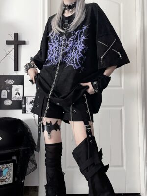 Black oversized Jirai Kei cotton t-shirt with purple thorn print and detachable metal chain, full-body front view in gothic studio setting