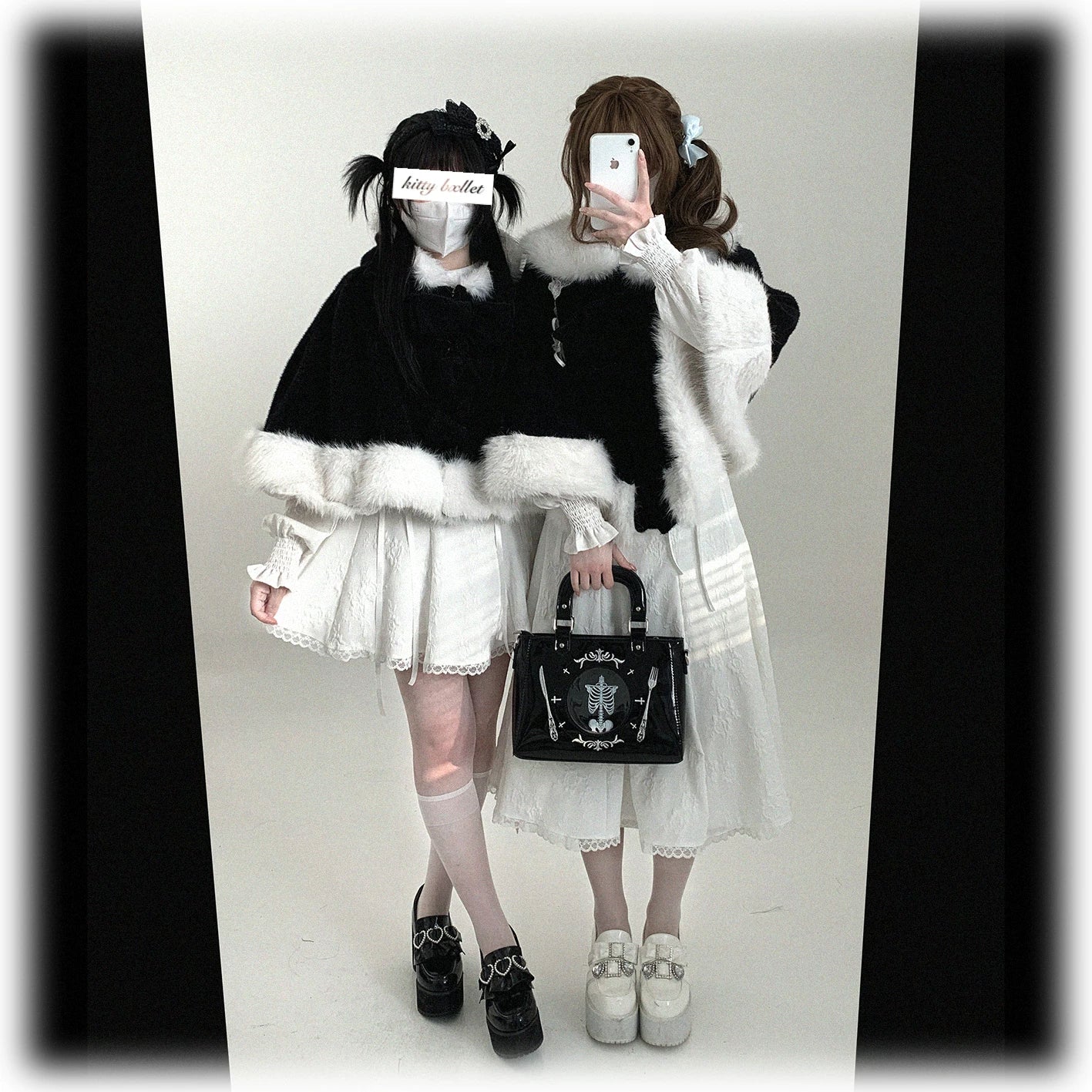 Detachable bow mechanism on cat-ear hooded cape shown in close detail, demonstrating customization options and attachment system