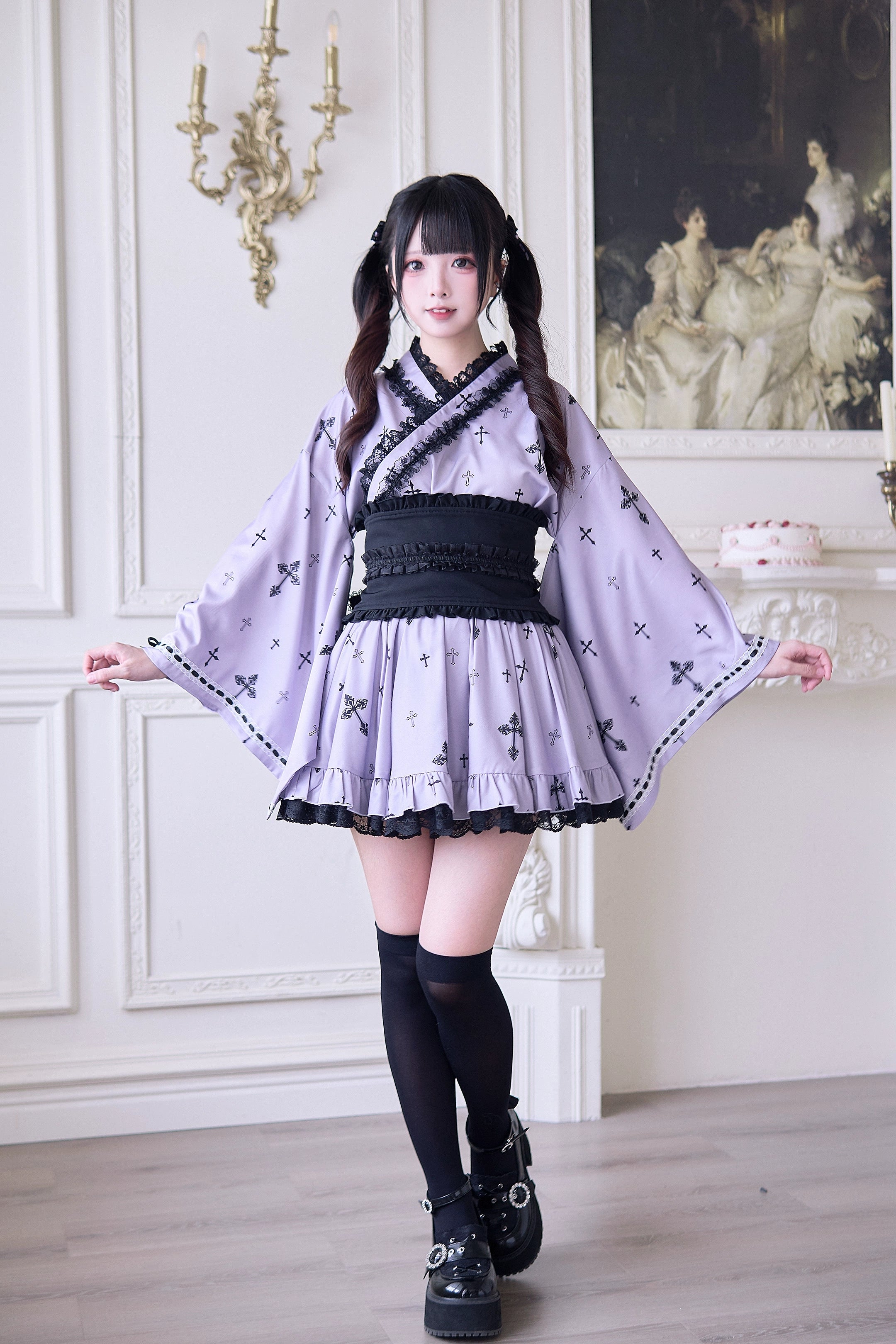 Lavender purple Jirai Kei kimono complete outfit front view - twin-tailed female model wearing black wide obi belt, ruffled mini skirt, and cross pattern blouse